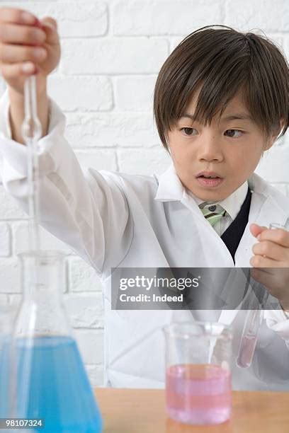 istock child holding pipette|478 Pipette Boy Stock Photos and High.